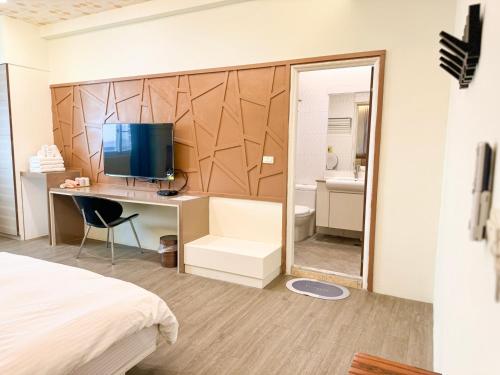 TV a/nebo společenská místnost v ubytování 綠島海灣會館Bay Resort