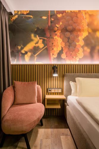 Weinhotel Sonnenscheinにあるベッド