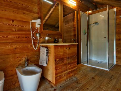 a bathroom with a sink and a shower at Villa San Liberale - Suites & Wellness - Villa Veneta in Feltre