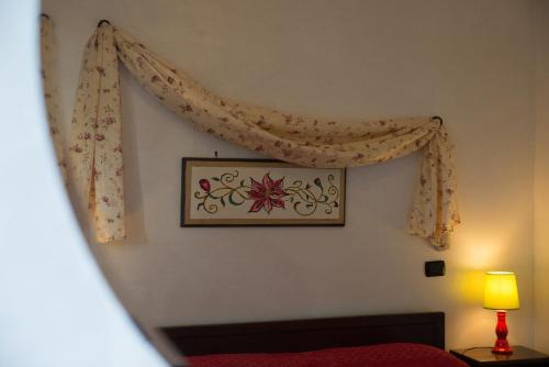 Postel nebo postele na pokoji v ubytování H.H.Le Palme