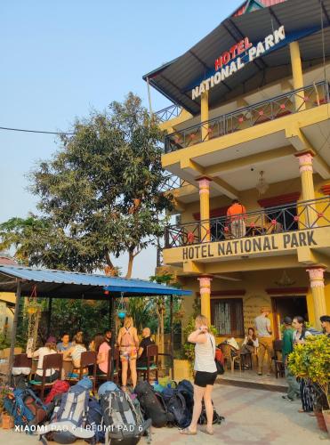 a group of people standing outside of a hotel national park at Hotel National Park- A peaceful Family home where you can stay Peace and Enjoy and Organize the wildlife Safari in Chitwan