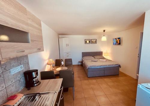 Ένα ή περισσότερα κρεβάτια σε δωμάτιο στο Apartments ZARA