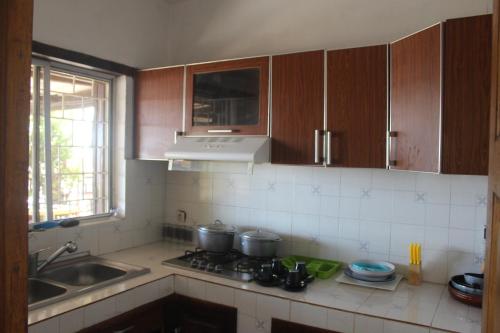 Una cocina o zona de cocina en Mauro Lodge