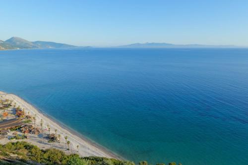 an aerial view of a beach and the ocean at Vila Bana in Qeparo