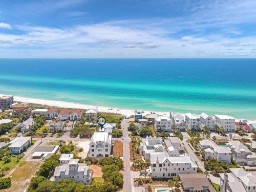 an aerial view of a beach with houses and the ocean at Somewhere With You in Inlet Beach