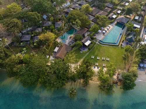 an aerial view of a house with two swimming pools at GajaPuri Resort Koh Chang in Ko Chang