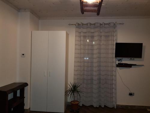 TV a/nebo společenská místnost v ubytování Bed and Breakfast MON AMOUR