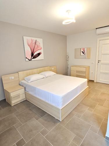Ένα ή περισσότερα κρεβάτια σε δωμάτιο στο Sea View Apartments