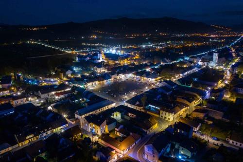 an aerial view of a city at night at Apartament Lawenda in Stary Sącz