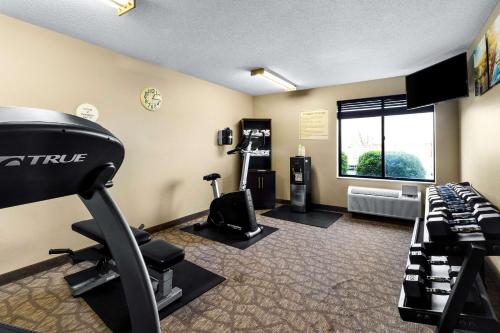 a fitness room with a gym with exercise equipment at Comfort Inn Evansville East in Evansville