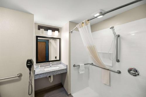 a bathroom with a sink and a shower at Quality Inn & Suites in Big Spring