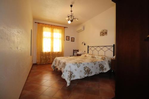 Posteľ alebo postele v izbe v ubytovaní casa Vincenzo