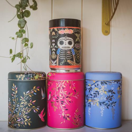 three different colored drums sitting next to each other at The Hideaway at Hidden Wood Glamping in Corsley