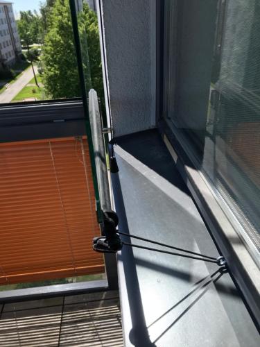 a window sill with a windowscriptionscriptionscription at Cozy flat with side Baltic Sea view in Pärnu