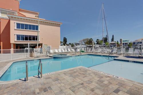 a large swimming pool in front of a building at Madeira Bay Resort I 1504 in St Pete Beach
