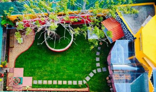 an overhead view of a yard with a soccer ball at La Courtyard in Puducherry