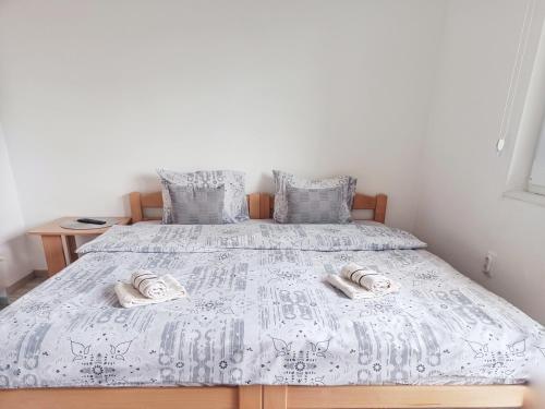 Postel nebo postele na pokoji v ubytování Apartment Diana