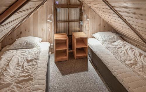 Lovely Home In Löttorp With Wifiにあるベッド