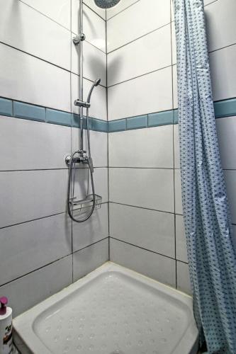 a bathroom with a shower and a bath tub at Finca el Almendro Archez in Árchez