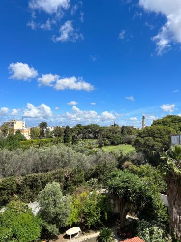 a view of a park with trees and bushes at Villa Reale Flats in Lecce