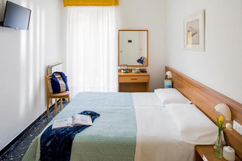 Ένα ή περισσότερα κρεβάτια σε δωμάτιο στο Hotel Mayola Mhotelsgroup