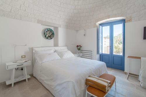 Postel nebo postele na pokoji v ubytování Borgofreddo Luxury Suite