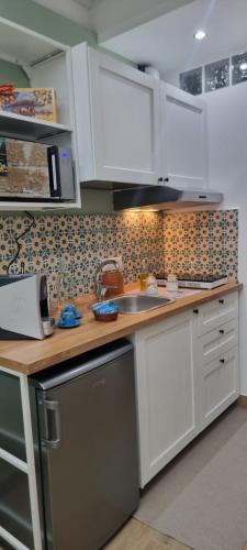 Una cocina o zona de cocina en Le Antiche Porte