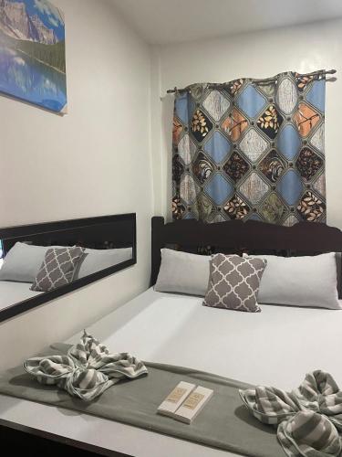 Cama o camas de una habitación en Dreamland budget room