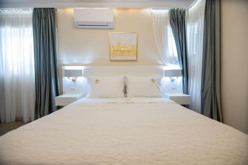 En eller flere senge i et værelse på Nobel apartment, Chania Town