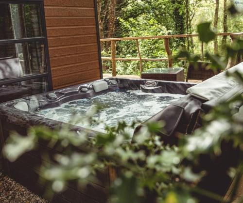 Zahrada ubytování Herons Lake Retreat Hot Tub Lodges