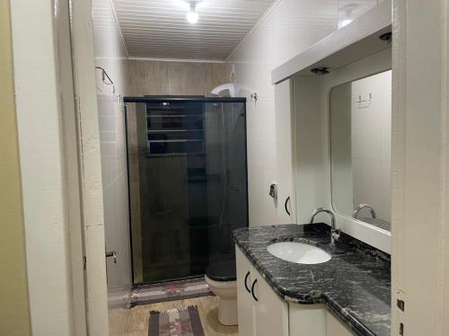 Kúpeľňa v ubytovaní Casa confortável
