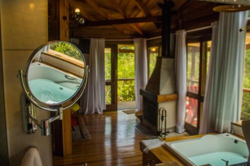Ένα ή περισσότερα κρεβάτια σε δωμάτιο στο Curucaca Hotel Brasil