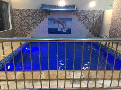 a pool on the second floor of a building at شاليهات رانديفو العاب مائية مع مسبح in Riyadh