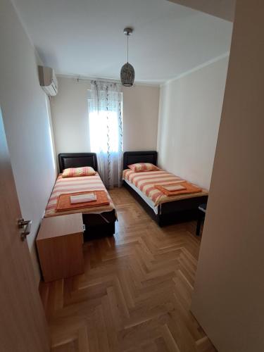 Postel nebo postele na pokoji v ubytování Apartman Verica