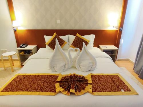 Aquavista Hotel & Suitesにあるベッド