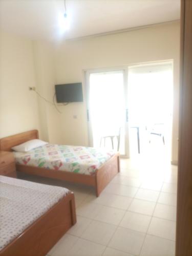 Llit o llits en una habitació de Rina's home