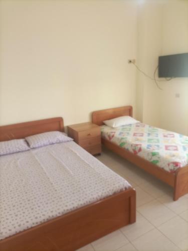 Llit o llits en una habitació de Rina's home