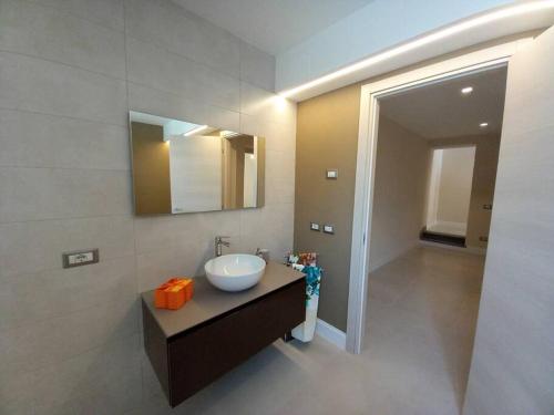a bathroom with a sink and a mirror at Casa Lina, Vallombrosa, wifi, private area in Tosi