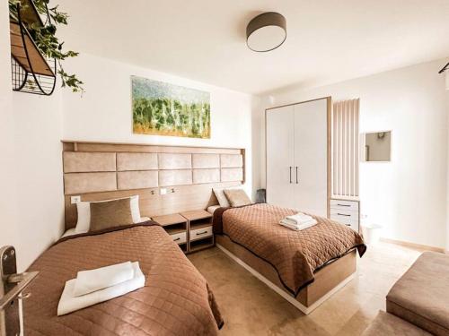 Postel nebo postele na pokoji v ubytování Beach Apartment 2Bed Small Oasis