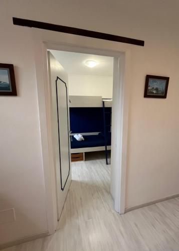 a hallway with a door leading into a room at Hill Valley View in Vico Equense