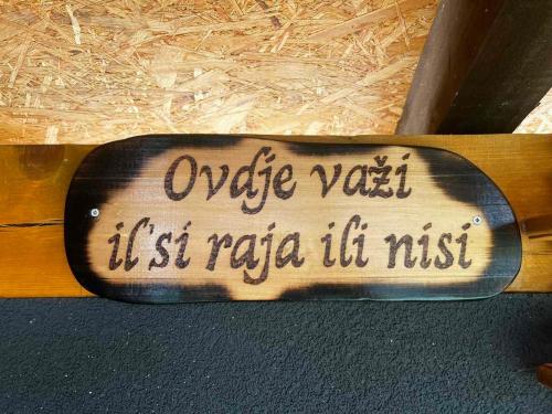 a skateboard with a sign that reads update vivoustra it must at Vila Sarajlić in Srebrenik