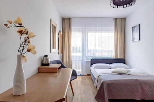 Postel nebo postele na pokoji v ubytování Willa Bliźniak - Pokoje i Apartamenty Bardzo Blisko Plaży