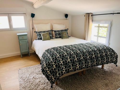 Postel nebo postele na pokoji v ubytování La Villa les lauriers, 150 m de la mer, Grimaud, golfe de St Tropez