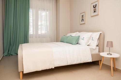 Letto o letti in una camera di Kaléstia
