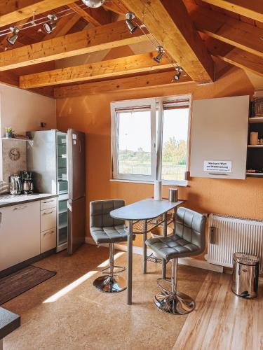 Η κουζίνα ή μικρή κουζίνα στο Schöne Wohnung mit großem Garten