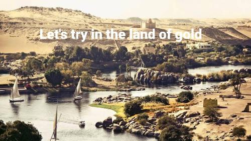 a river with boats in it with the words lets try in the land of gold at Private transportation in Aswan