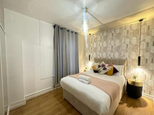 Lova arba lovos apgyvendinimo įstaigoje London Eye Two Bedroom Apartment