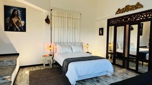 Postel nebo postele na pokoji v ubytování Hotel Caney campestre Villa de Leiva