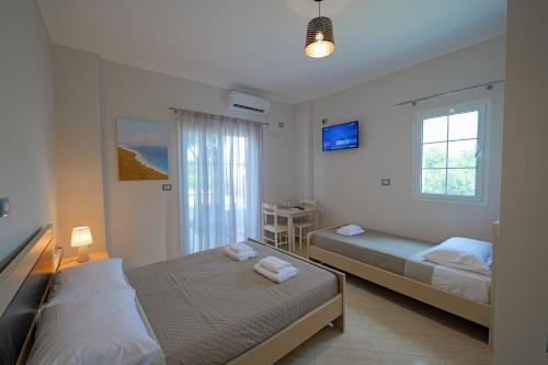 Postel nebo postele na pokoji v ubytování Hotel Deja Vu
