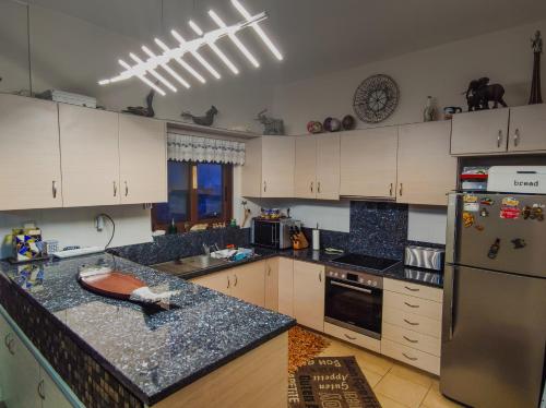 Köök või kööginurk majutusasutuses Direti villa